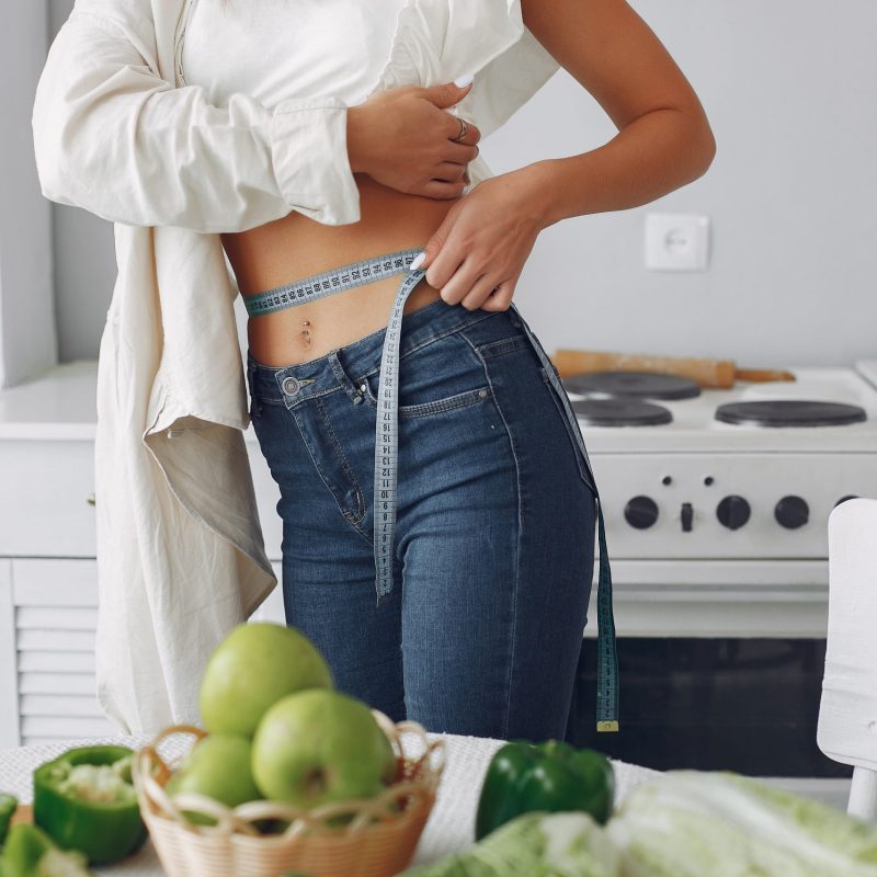 beautiful-sporty-woman-kitchen-with-vegetables-scaled-1